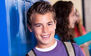 Teen boy wearing braces