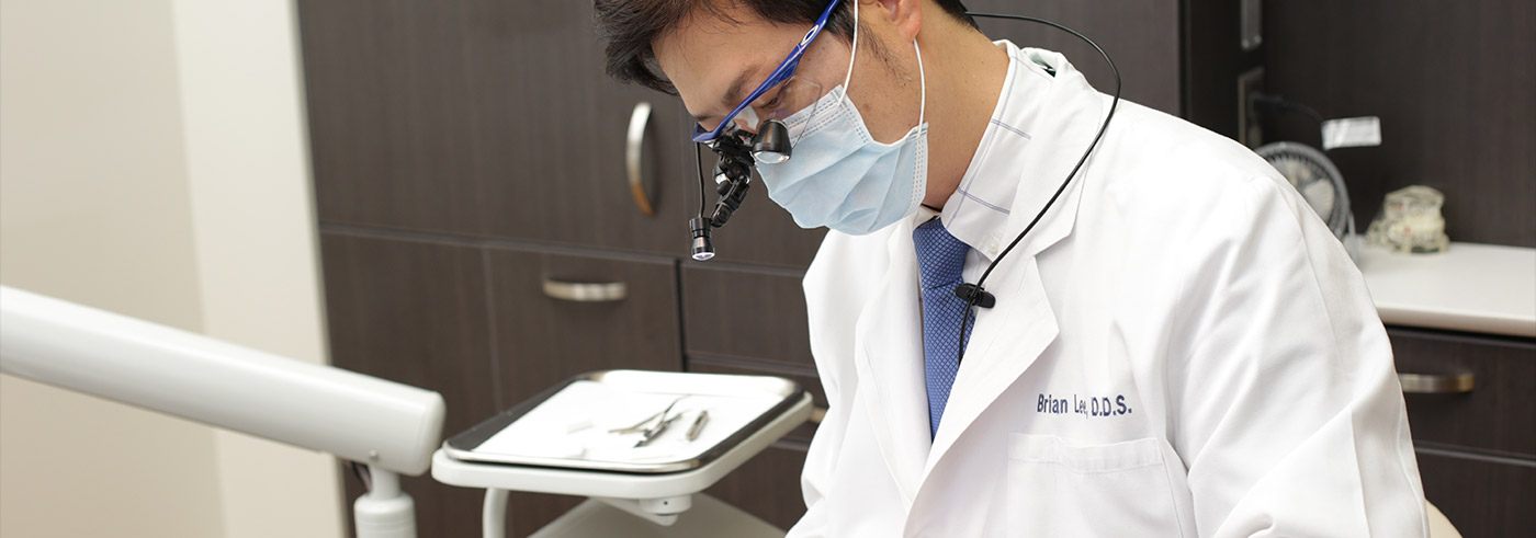 Dentist treating patient