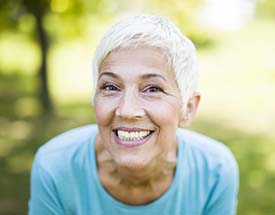 senior woman grinning from ear to ear