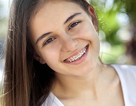 Smiling teen girl with braces