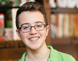 Smiling teen boy with braces