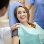 A woman learning about her dental benefits.