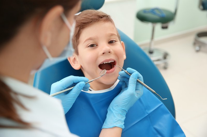 a young boy at the dentist