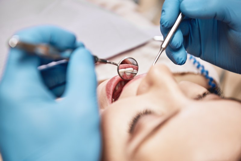 Woman receiving a dental checkup